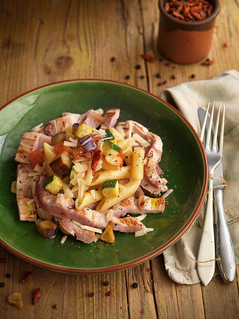 Penne with pork, zucchini, and eggplant