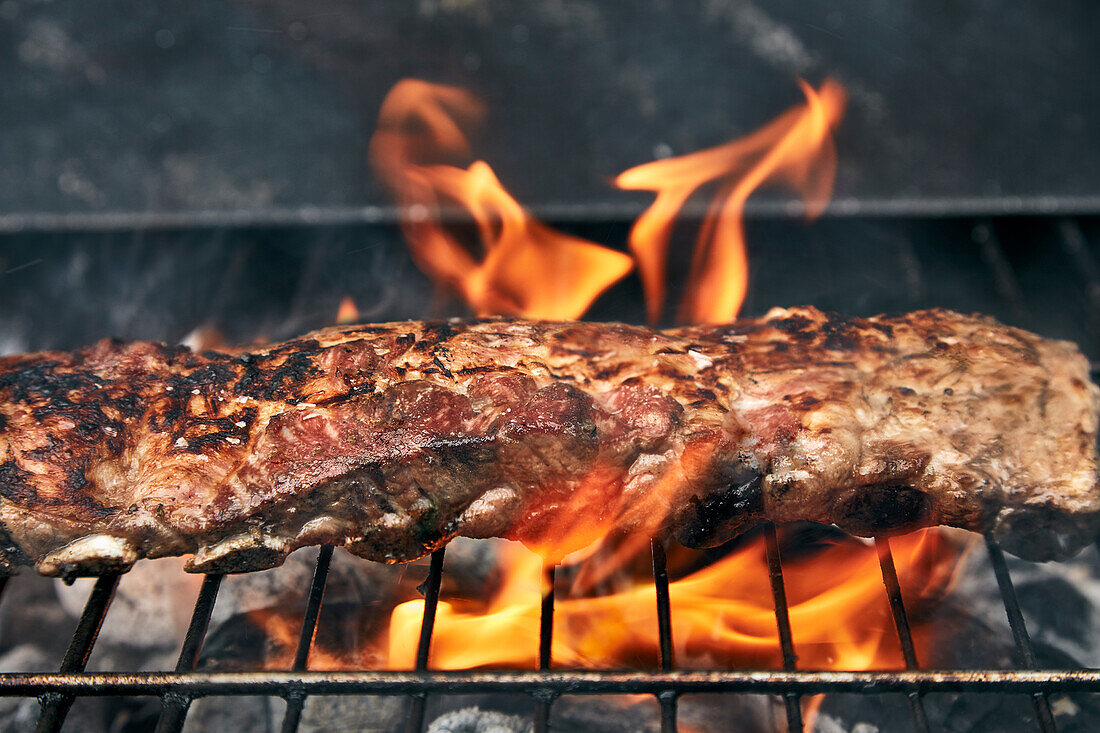 Beef on charcoal grill