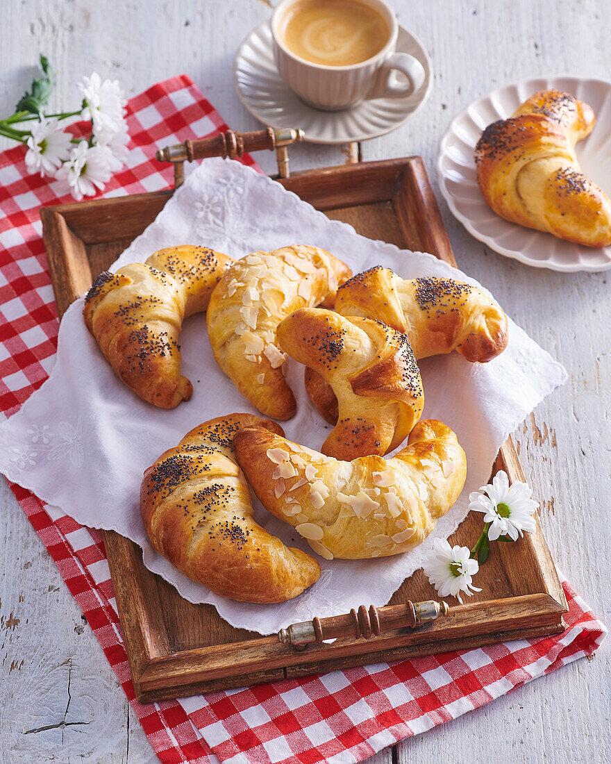 Sweet yeast croissants with coffee