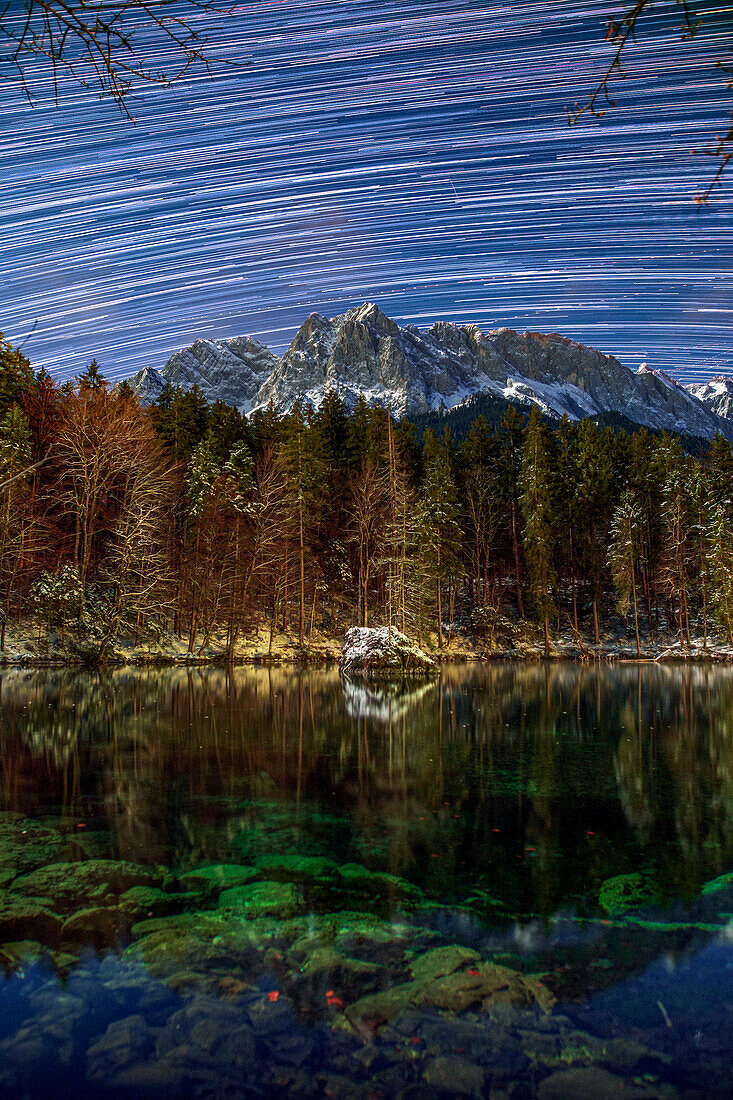 Star trails over Lake Badersee, Bavaria, Germany