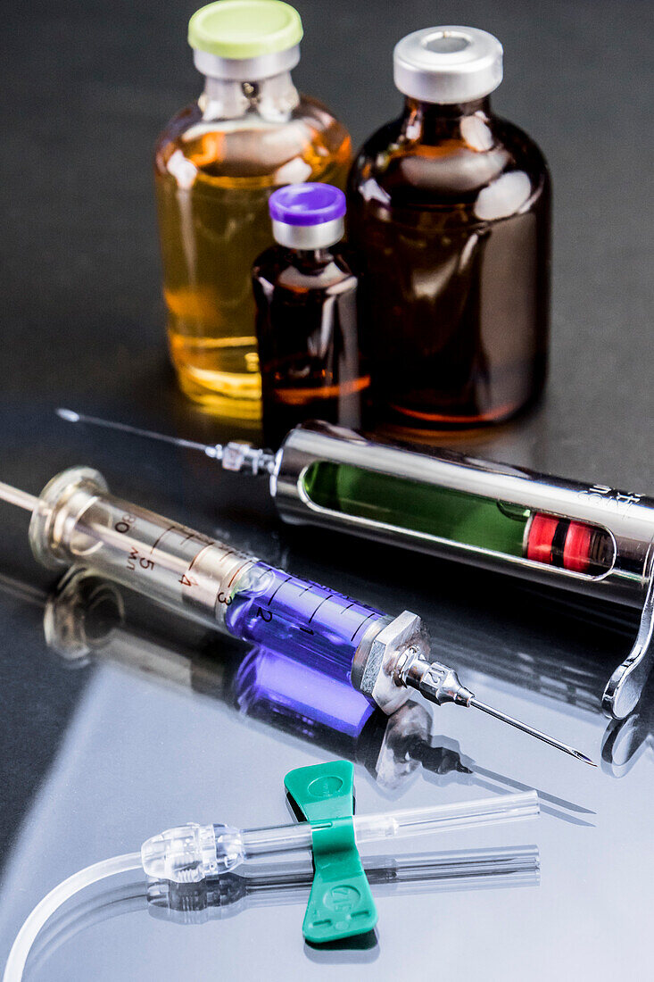 Phials and syringe in laboratory