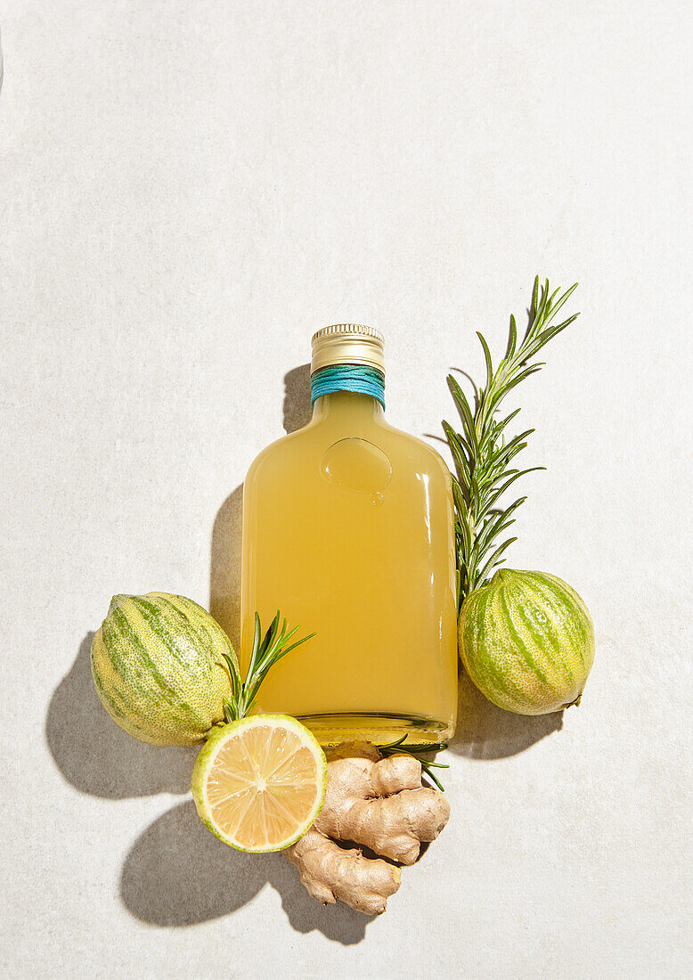Lemon ginger syrup made from tiger lemons, ginger root, and rosemary