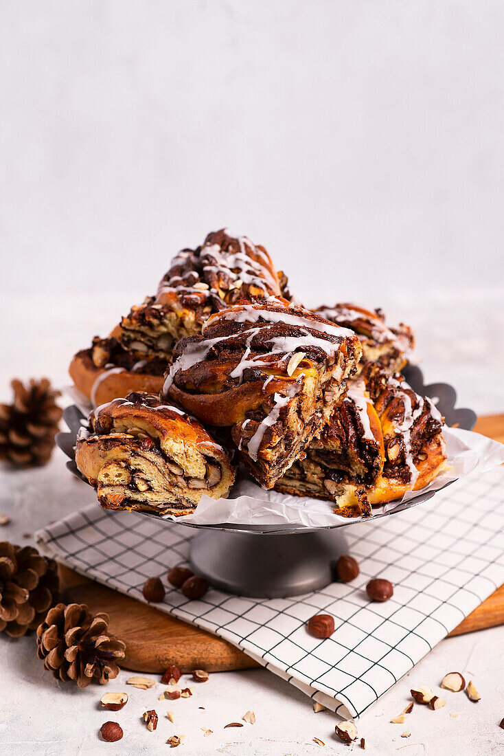 Yeast cake with nuts raisins chocolate filling and frosting