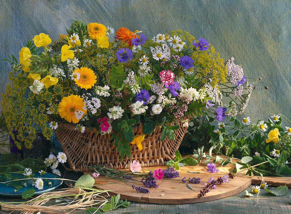 Basket with various flowering herbs