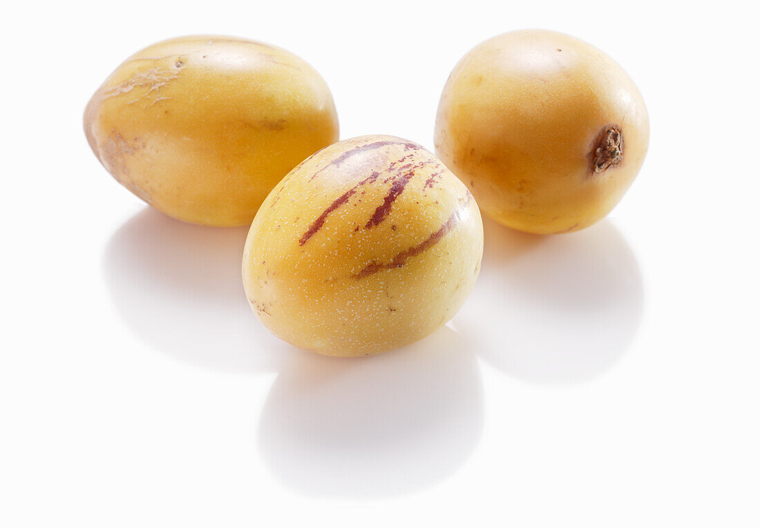 Pepino mini melons on a white background