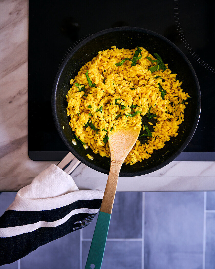 Yellow risotto with herbs