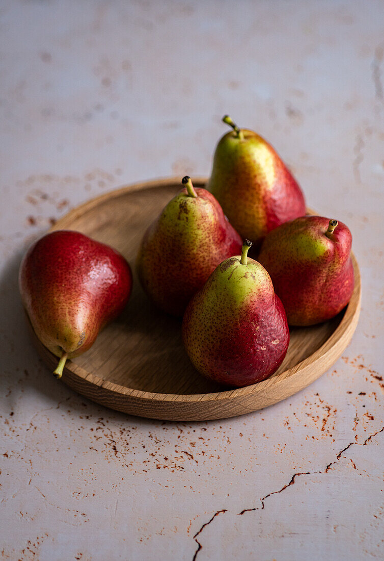 South African pears on a wooden tray