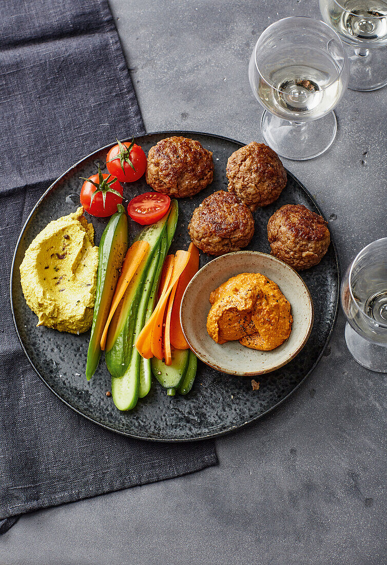 Vegetable sticks with minced beef meatballs and two kinds of dips