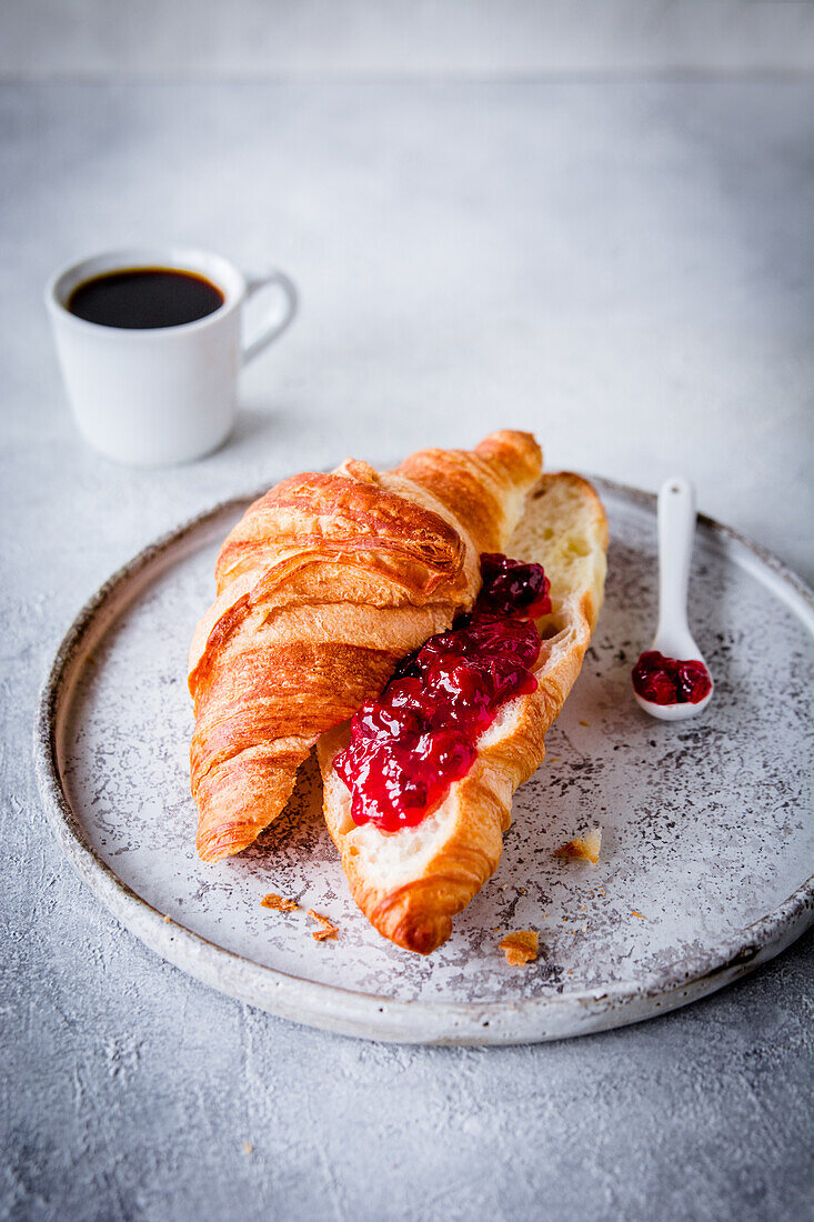 Croissant with raspberry jam