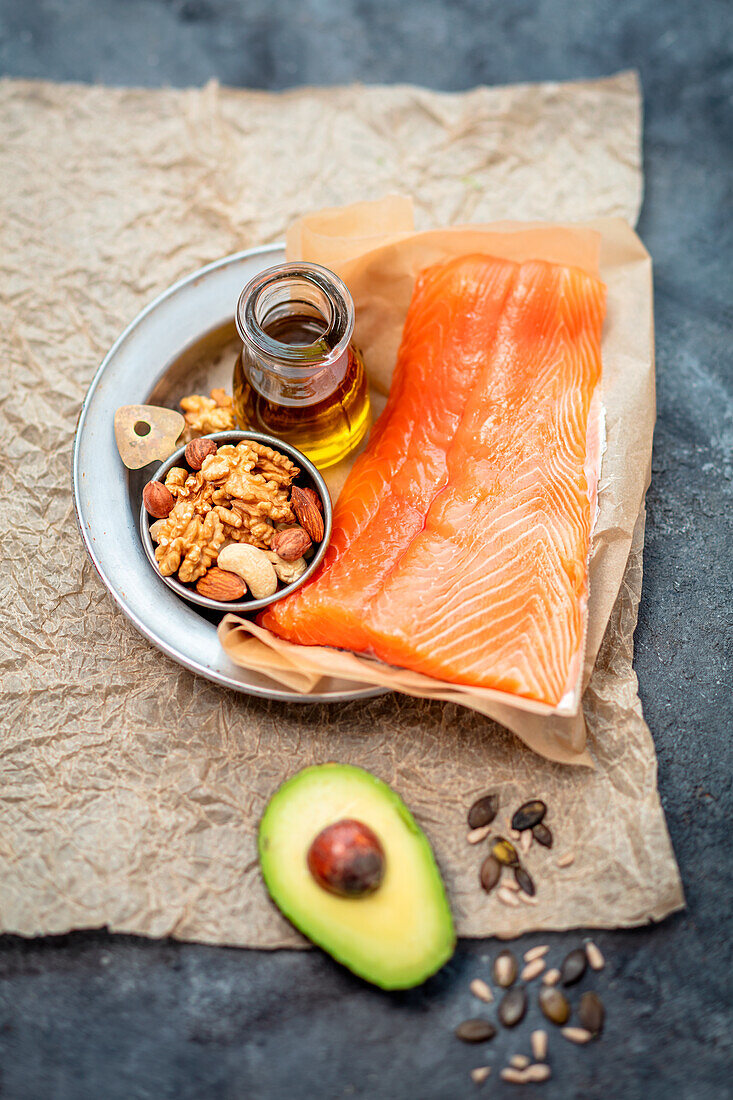 Various sources of good fats - salmon, nuts and seeds, olive oil, and avocado