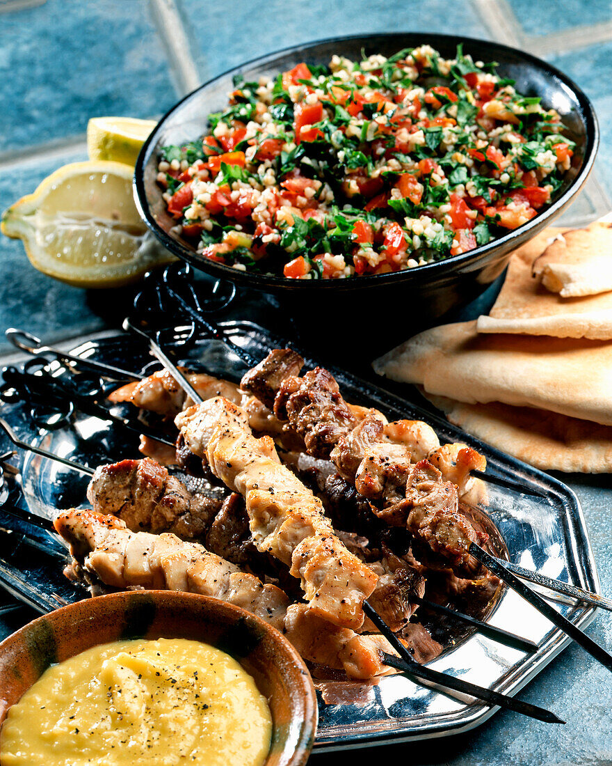 Lebanese meat skewers with tabouleh