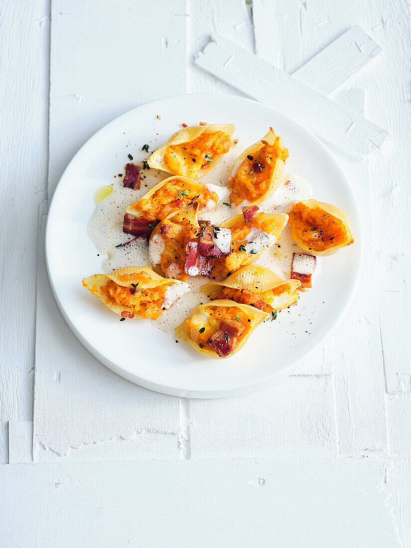 Pumpkin conchiglioni with pancetta parmesan sauce and mozzarella cheese