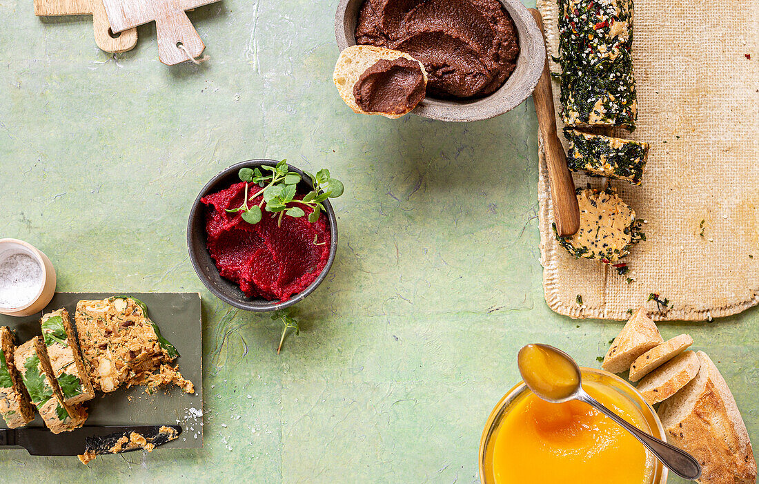 Shiitake miso butter, lentil and beetroot dip, chocolate hummus, curd, sesame seaweed butter