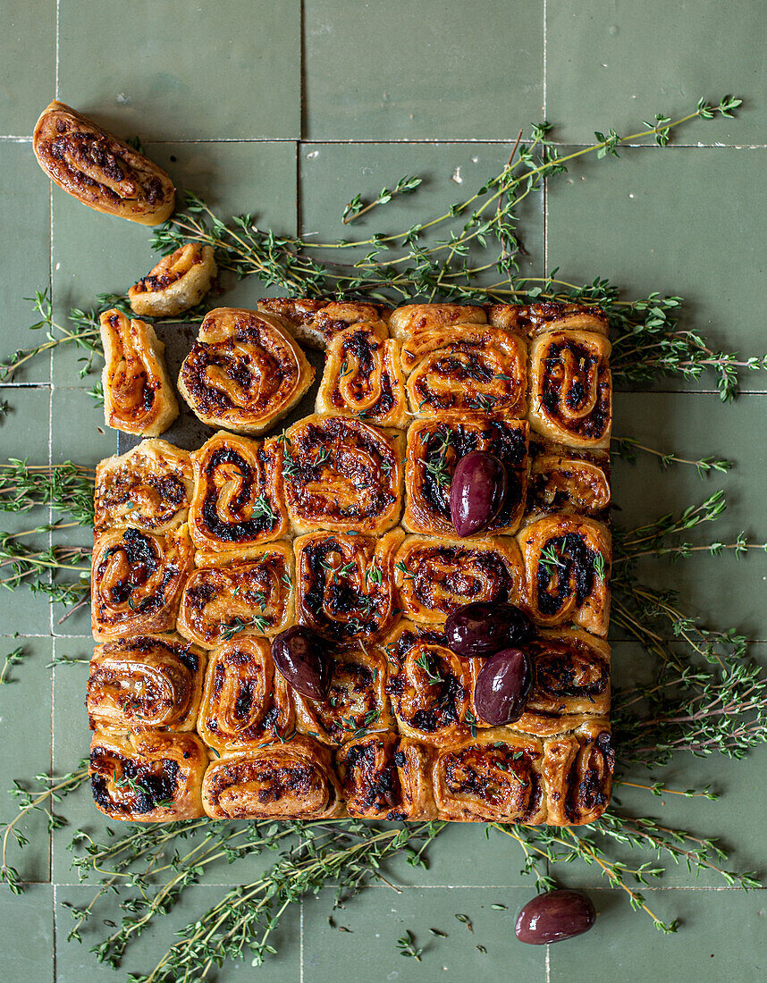 Parmesan folded bread with olive tapenade and red pesto