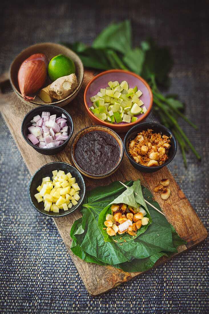 Miang kham with ingredients (stuffed pepper leaves from southern Thailand)