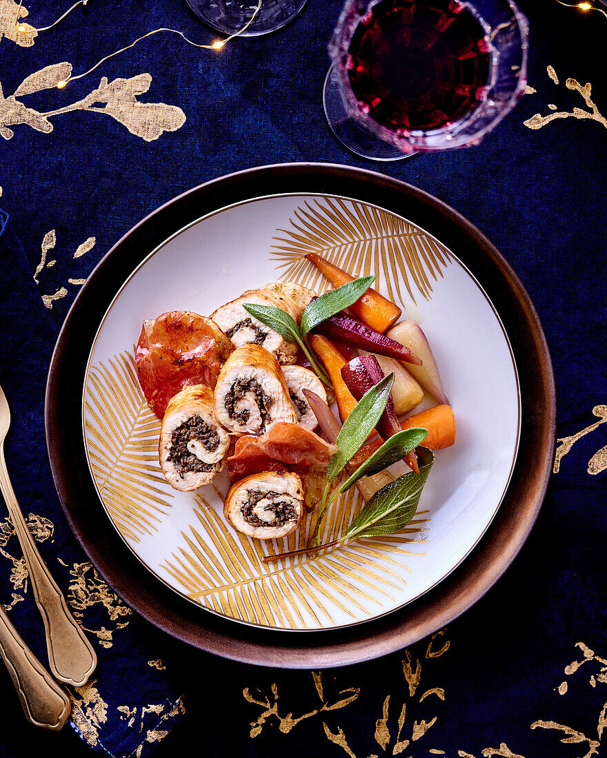 Veal rolls with a truffle filling and root vegetables