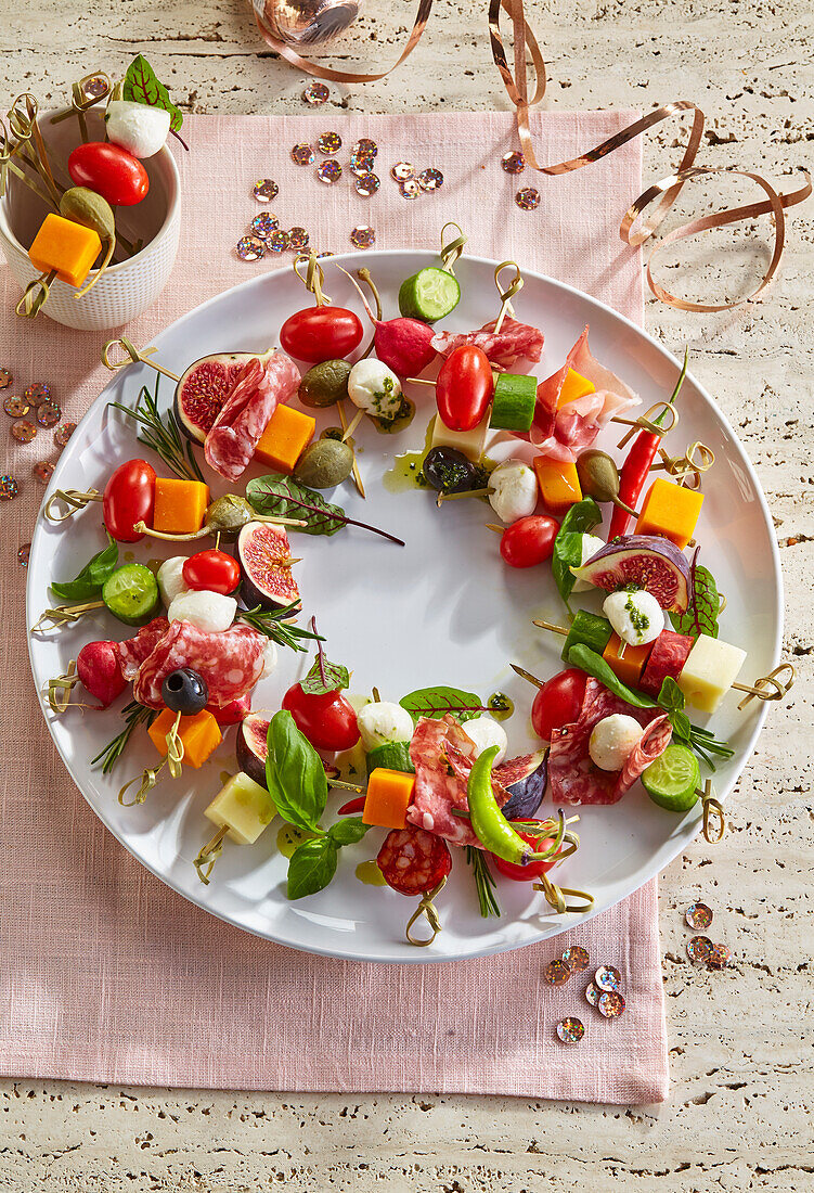 Mini party skewers arranged in a wreath shape
