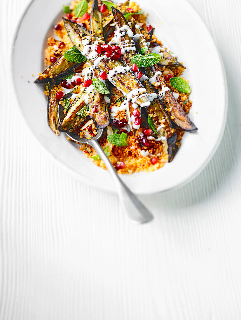 Aubergine and pomegranate couscous with buttermilk dressing