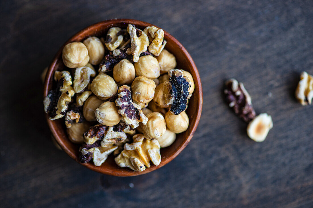 Mixed nuts in wooden bowl