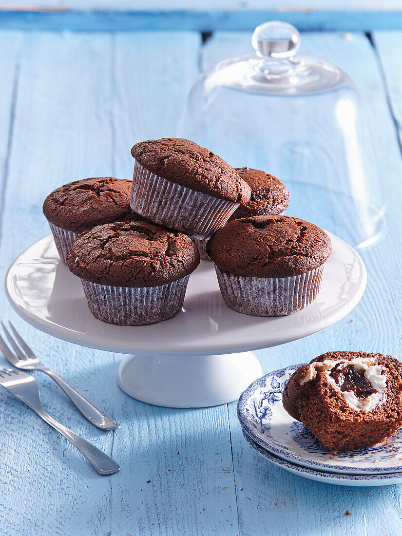 Chocolate muffins filled with cream cheese and plum butter