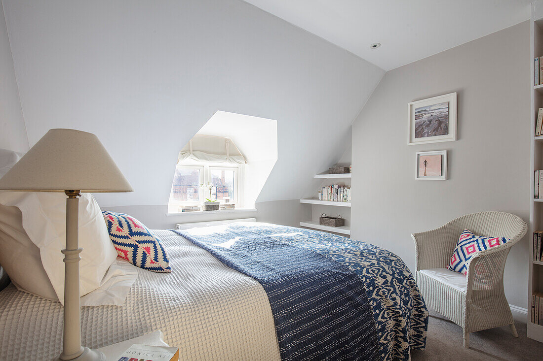 Queen bed in the guest room in the attic