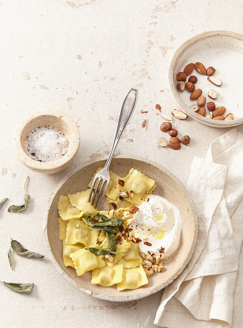 Sage butter ravioli with nuts