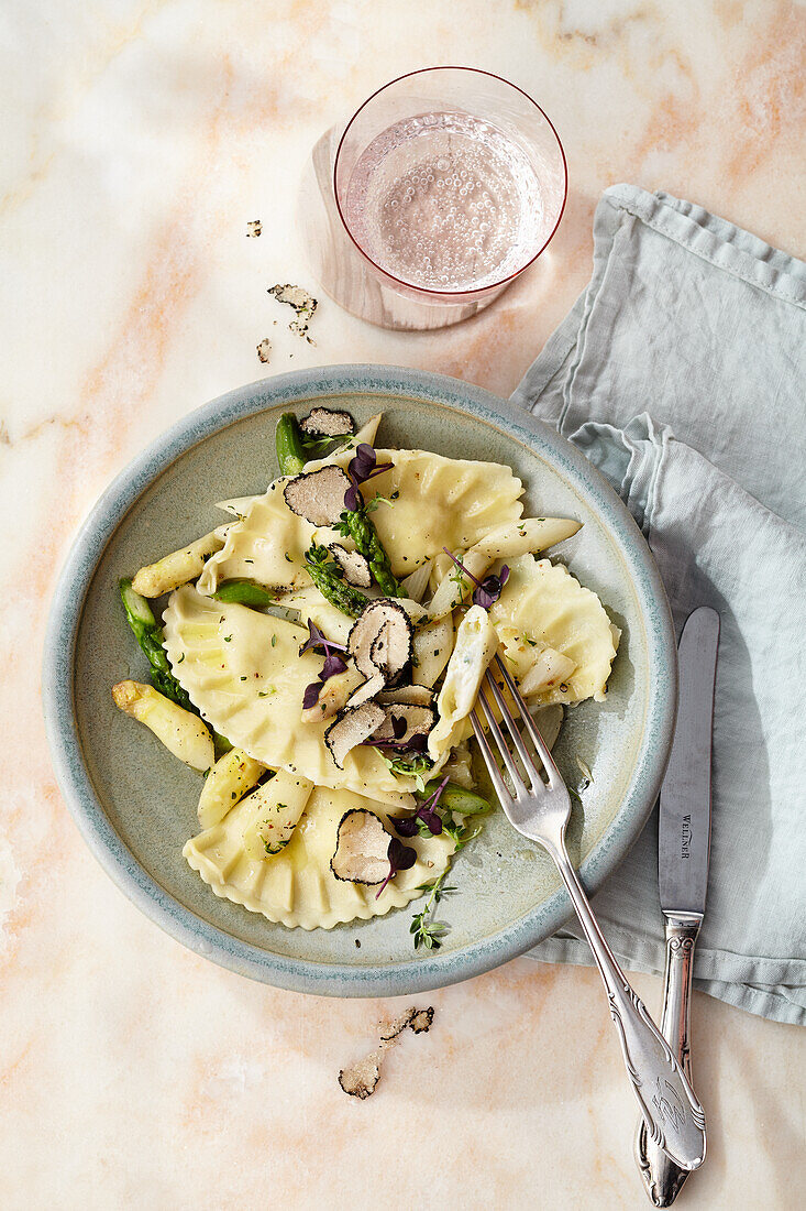 Ricotta truffle ravioli with roasted white asparagus