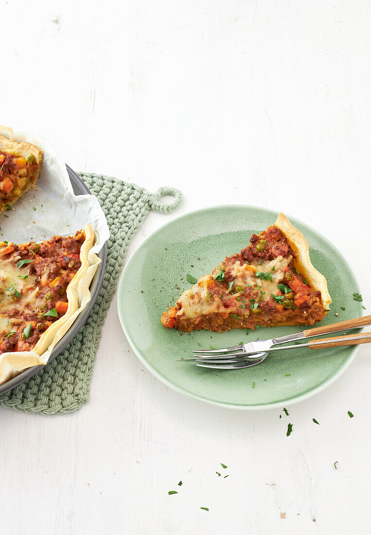Vegan vegetable quiche with frozen vegetables and ground beef substitute