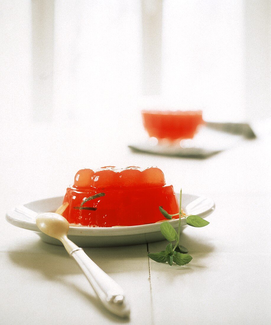 Grapefruit jelly on dessert plate