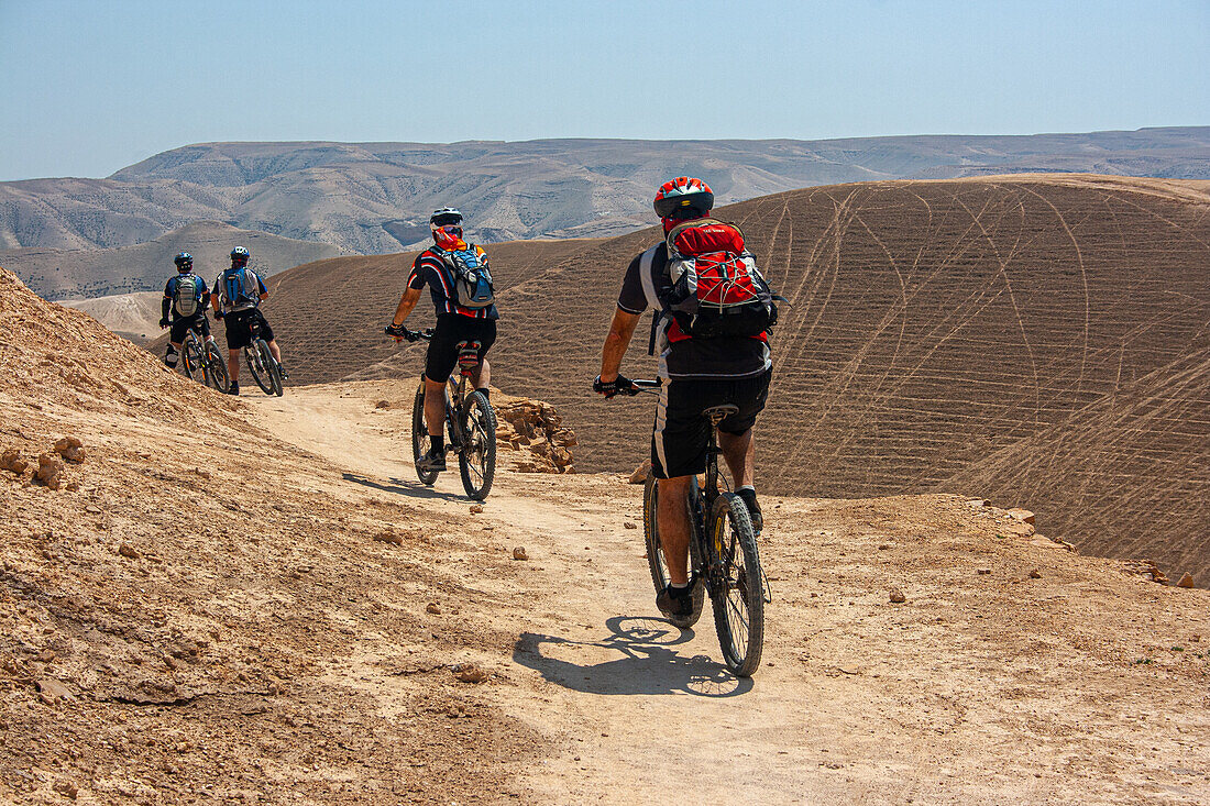 Group of off road desert cyclists