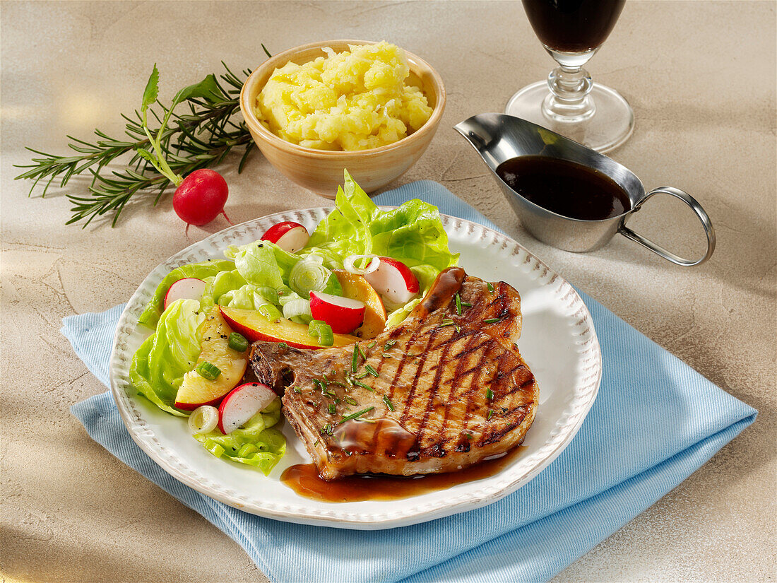 Fried pork chops with salad