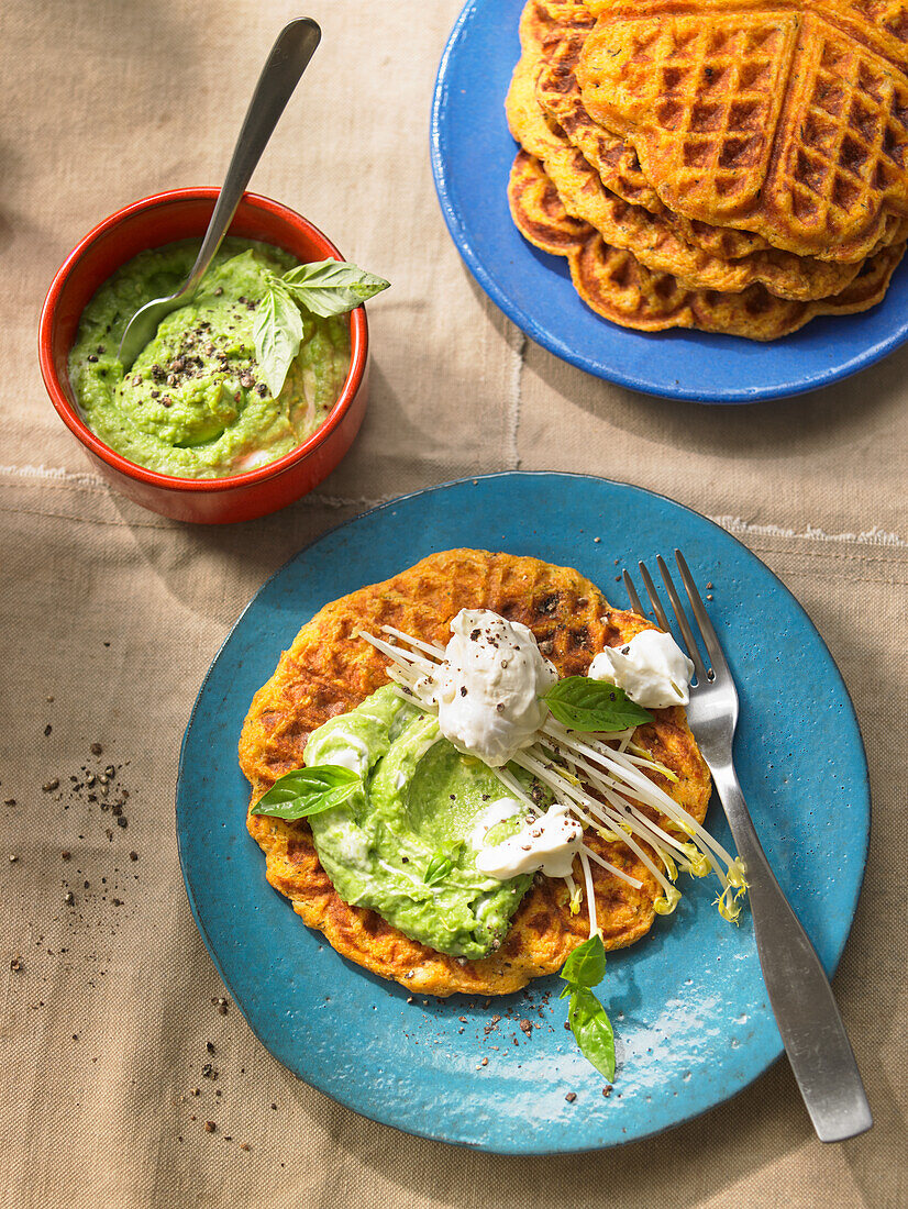 Hearty sweet potato waffles with pea dip and burrata