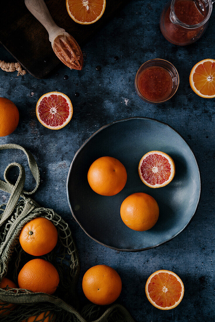 Sliced Sicilian blood oranges and fresh red orange juice