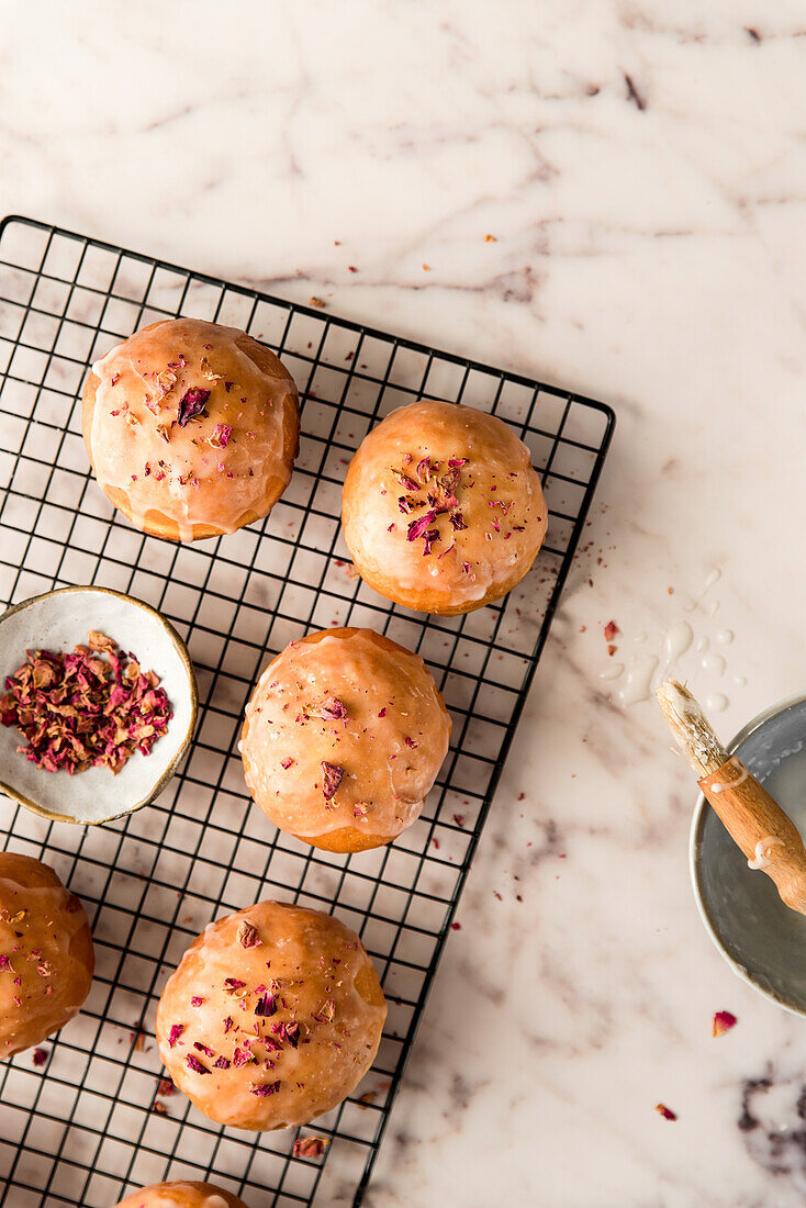 Donut with jam and rose petals