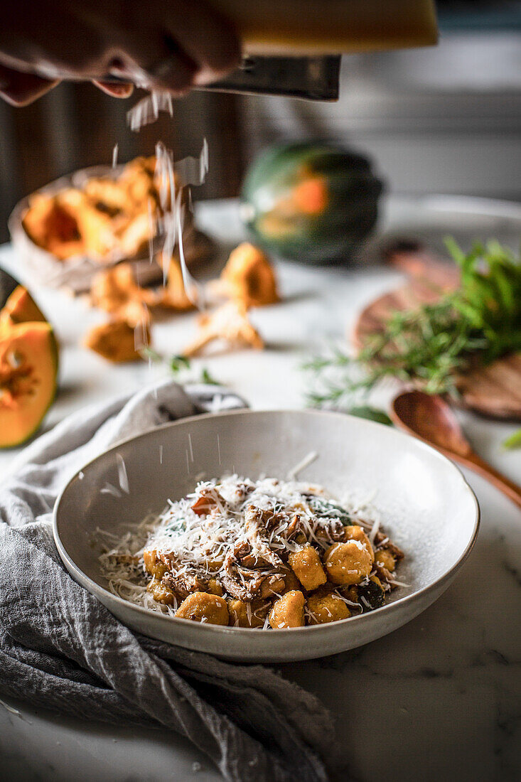 Squash gnocchi with chanterelles, olive oil and parmesan