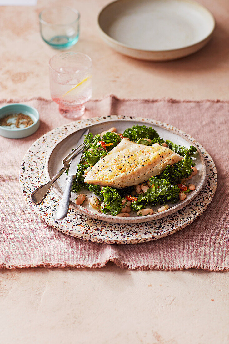 Marinated beans with kale and cod