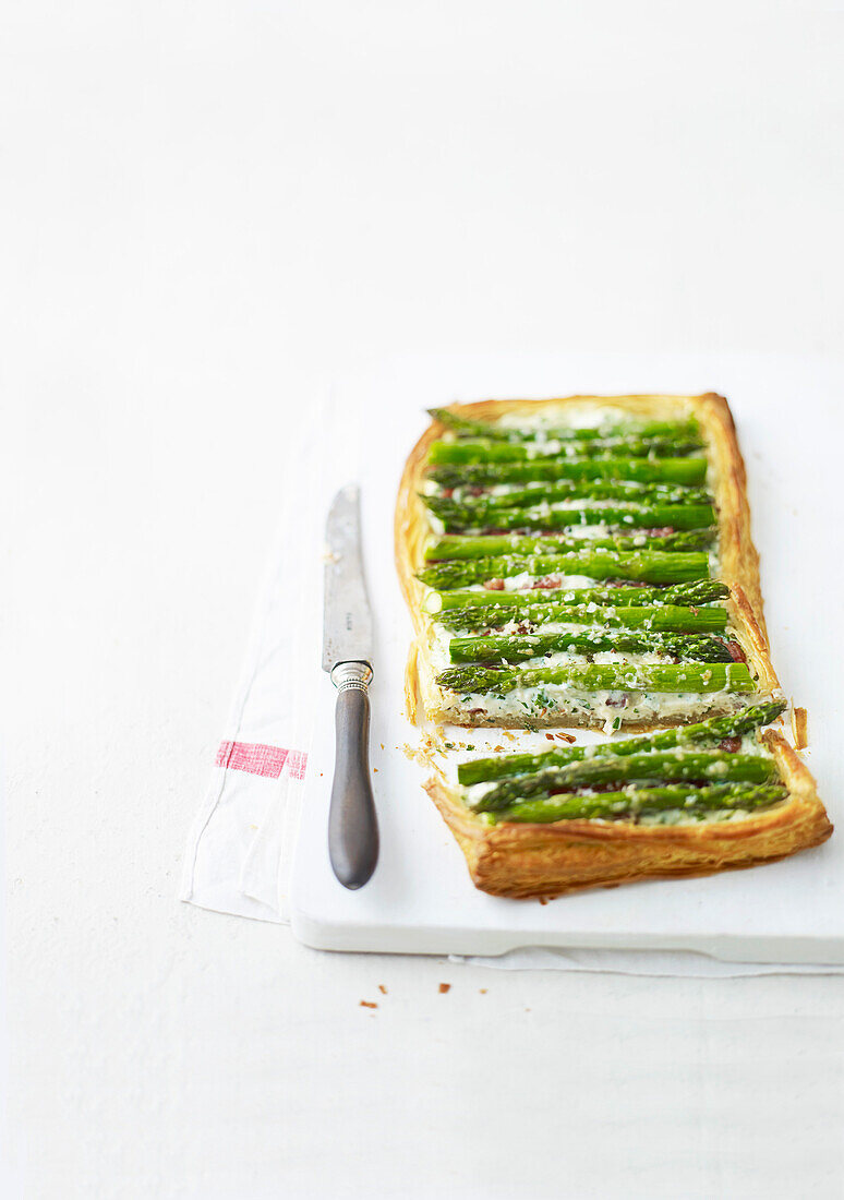 Asparagus tart with bacon and herbs