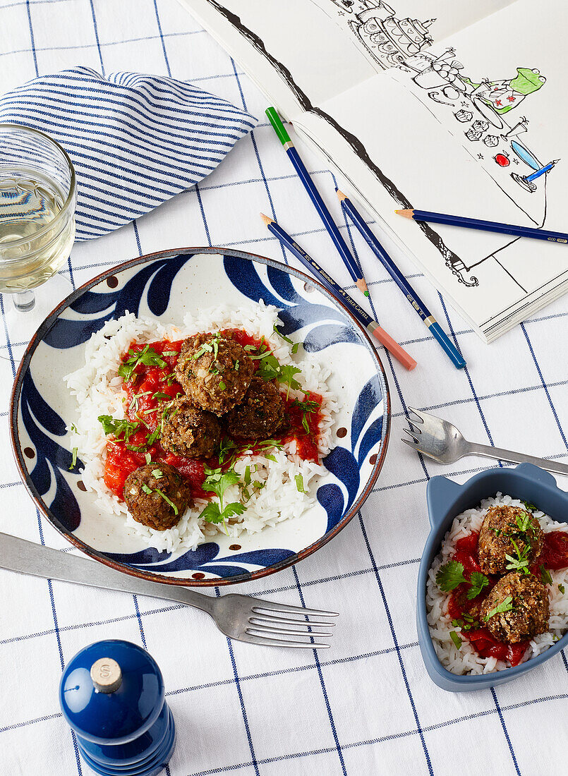 Meatballs with rice in tomato sauce