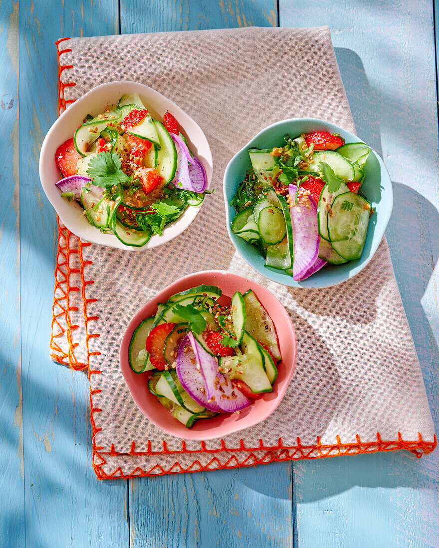 Cucumber salad with radishes and strawberries