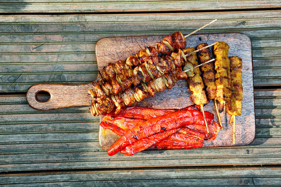 Turkey skewers, soy skewers, and grilled pointed peppers