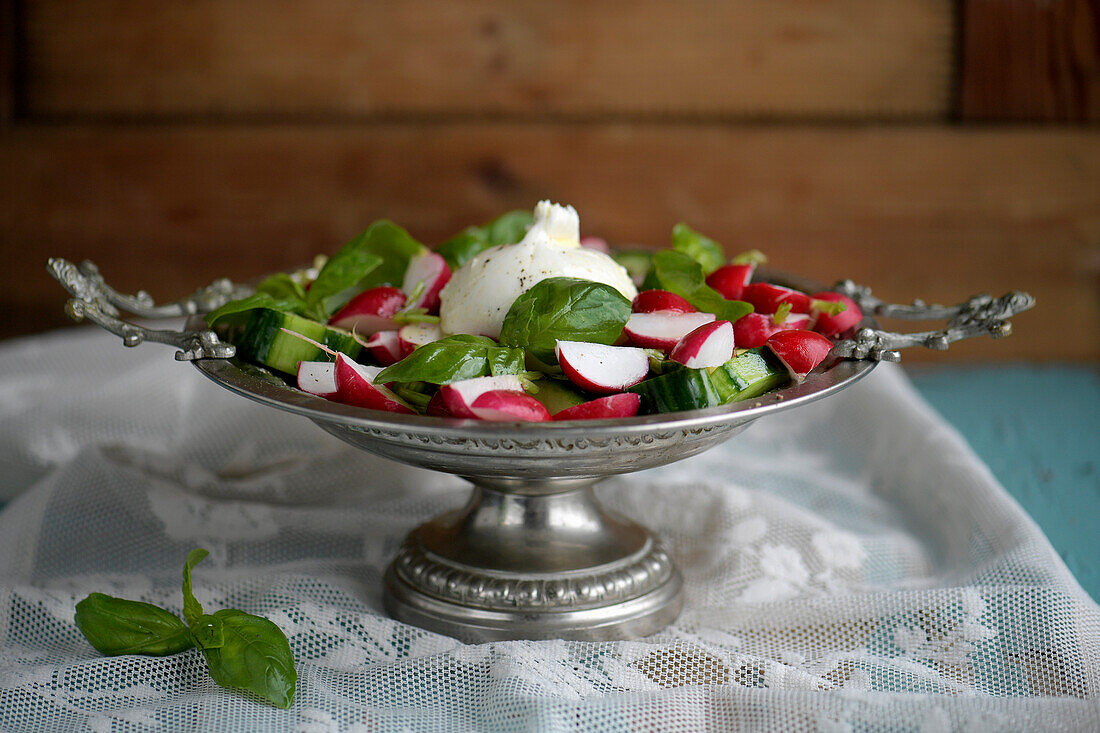 Radish salad with burrata, basil, lime and cucumber