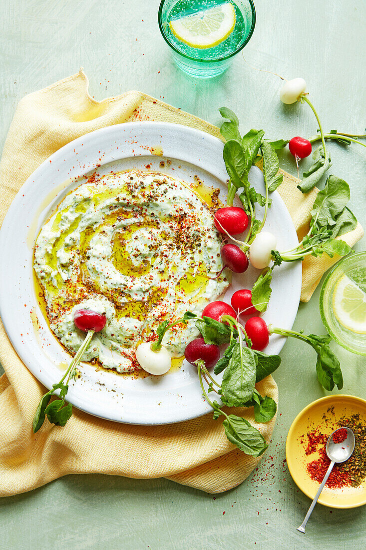 Whipped feta with oil, spices and radish