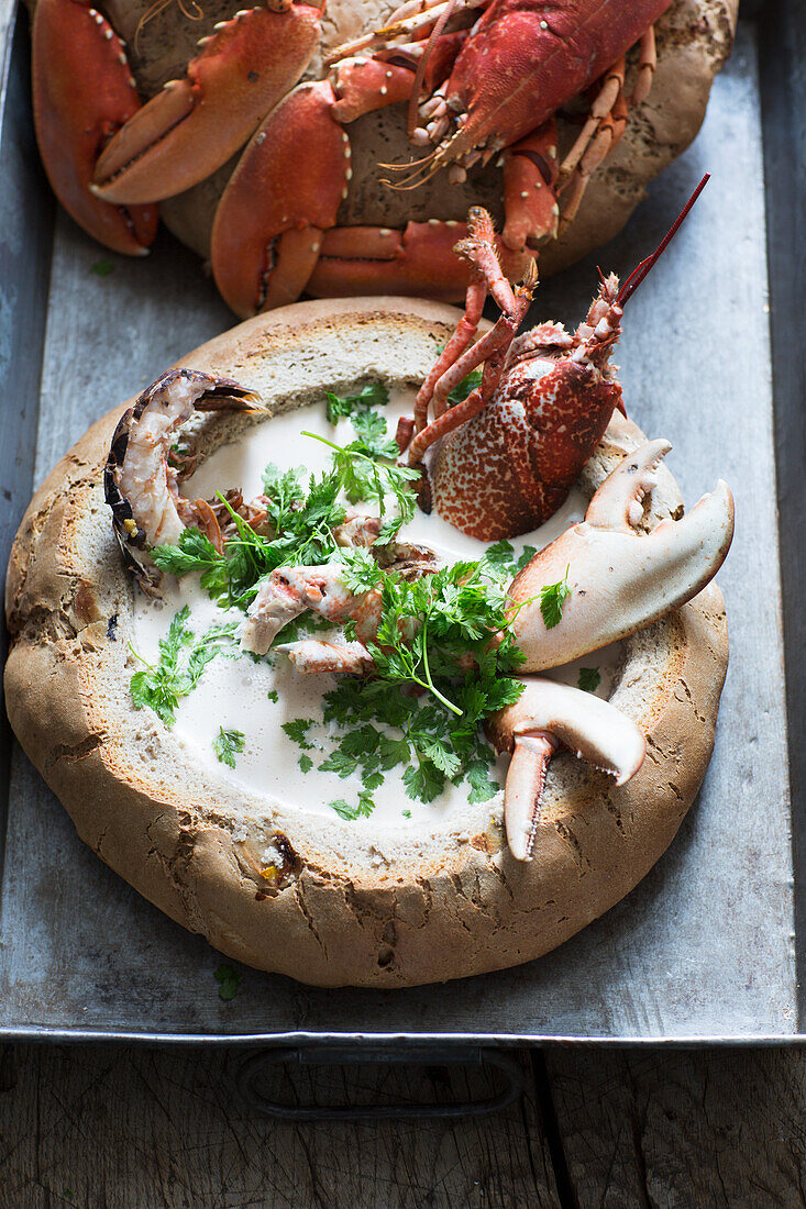 Lobster stew in a loaf of bread