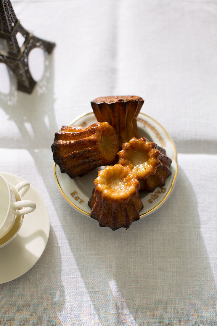 Canelé - French pastry with rum and custard centre
