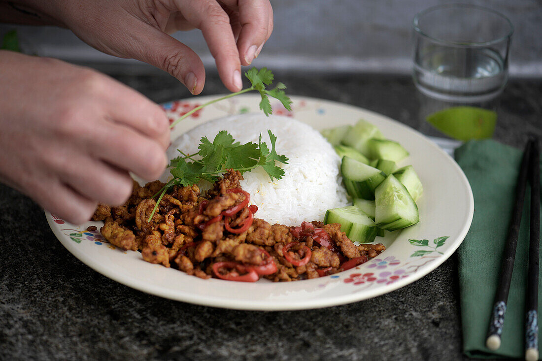 Asian minced chicken with rice and cucumber