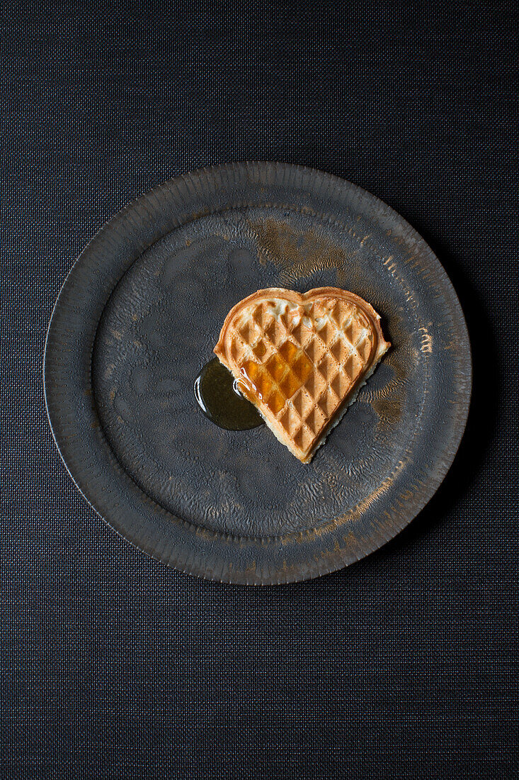 Vegan beer waffle with maple syrup