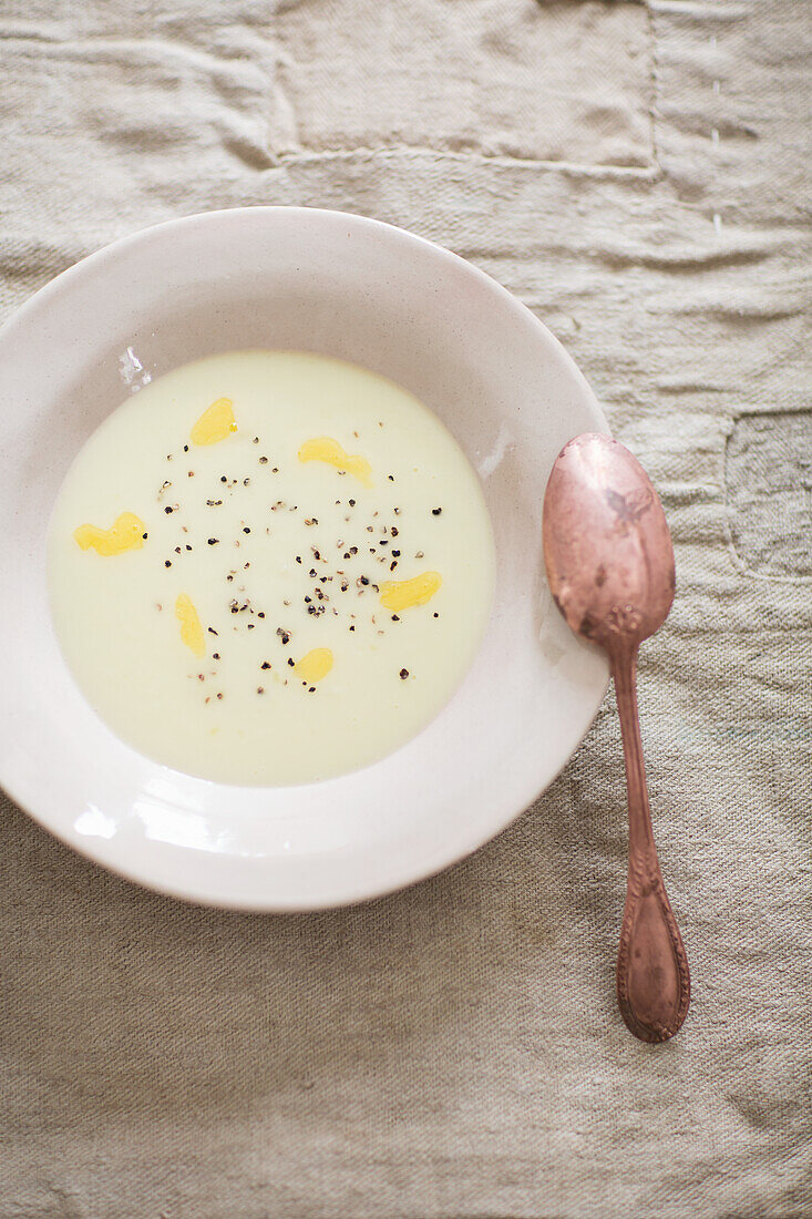 Cream of potato soup with black sesame seeds