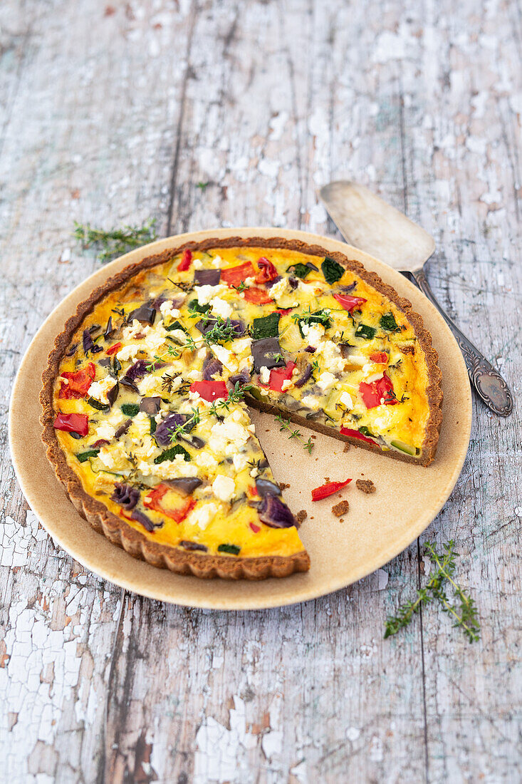 A gluten-free vegetable quiche made with sweet potato flour