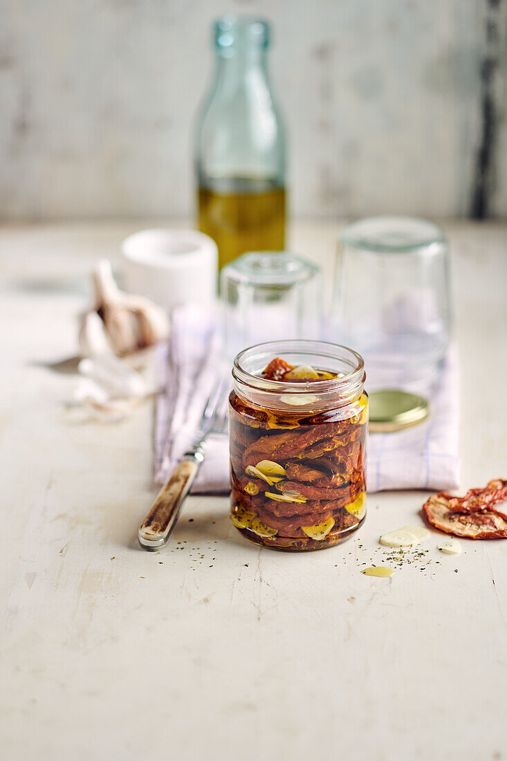 Pickled dried tomatoes with olive oil, garlic, and herbs