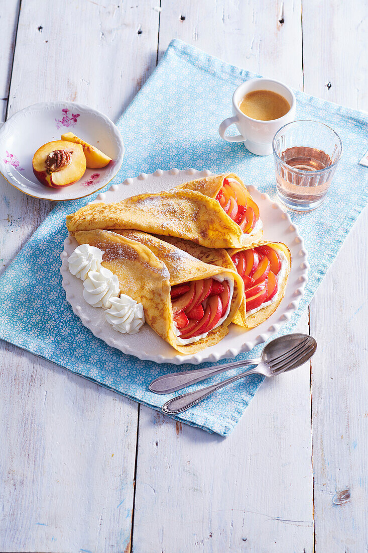 Peach and strawberry crepes